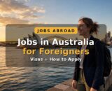 Jobs in Australia for foreigners — smiling worker in front of the Sydney Opera House and harbour skyline